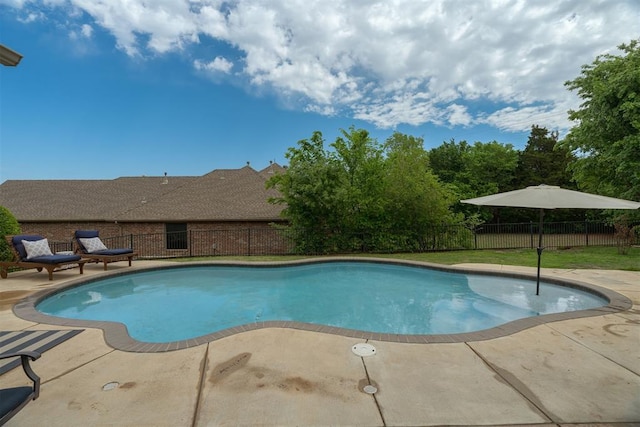 view of pool with fence, a patio area, and a fenced in pool