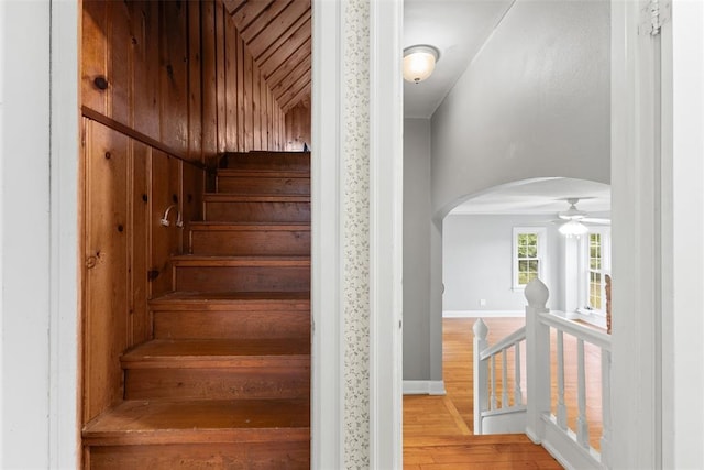 1201 E 18th St, Ada, OK 74820 - stairs with baseboards, arched walkways, a ceiling fan, and wood finished floors
