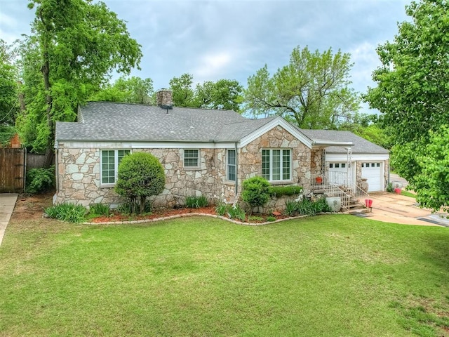 ranch-style home featuring a chimney, driveway, an attached garage, and stone siding