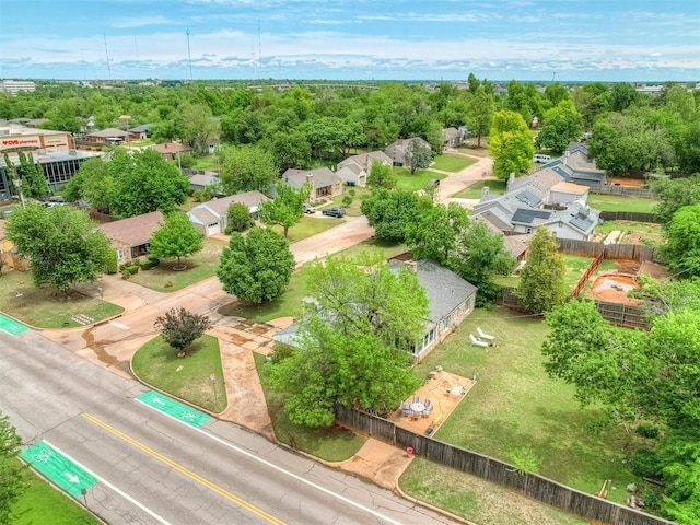 birds eye view of property with a residential view