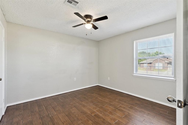 586 Seikel Dr, Choctaw, OK 73020 - unfurnished room with wood finished floors, a ceiling fan, a textured ceiling, and baseboards