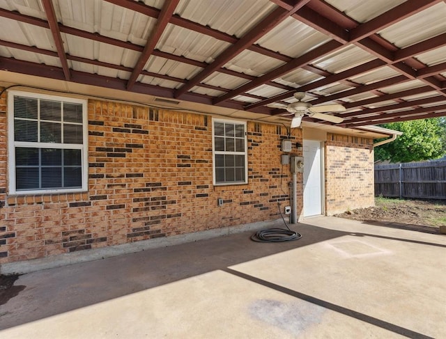 586 Seikel Dr, Choctaw, OK 73020 - view of patio / terrace with a ceiling fan and fence