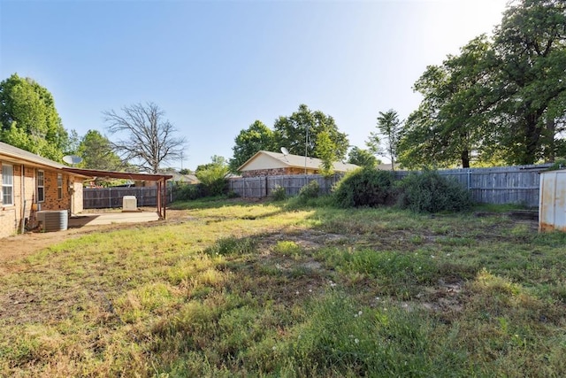 586 Seikel Dr, Choctaw, OK 73020 - fenced backyard featuring a patio and cooling unit