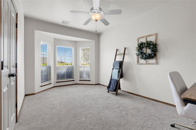 4679 Hillcrest Ln, Edmond, OK 73025 - unfurnished office with baseboards, a ceiling fan, carpet flooring, and visible vents