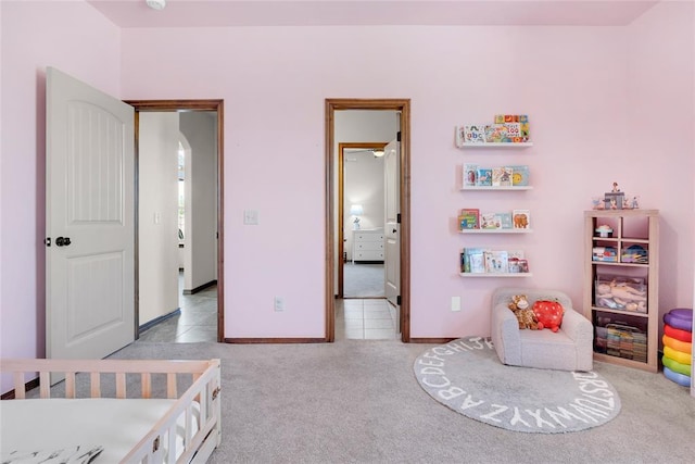 4679 Hillcrest Ln, Edmond, OK 73025 - bedroom with light colored carpet and light tile patterned floors