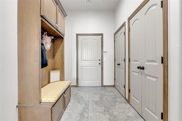 4679 Hillcrest Ln, Edmond, OK 73025 - mudroom with light tile patterned floors