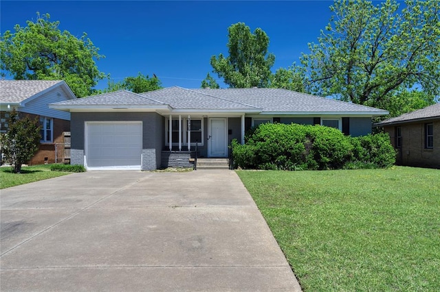 ranch-style house with covered porch, driveway, brick siding, a front lawn, and an attached garage