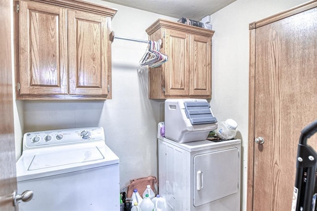 908 County St Unit 2932, Tuttle, OK 73089 - laundry room with washer and clothes dryer and cabinet space