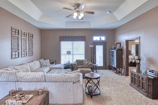 908 County St Unit 2932, Tuttle, OK 73089 - living area with light colored carpet, a raised ceiling, and ceiling fan