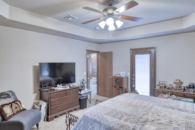 908 County St Unit 2932, Tuttle, OK 73089 - bedroom featuring carpet flooring, a tray ceiling, visible vents, and ceiling fan