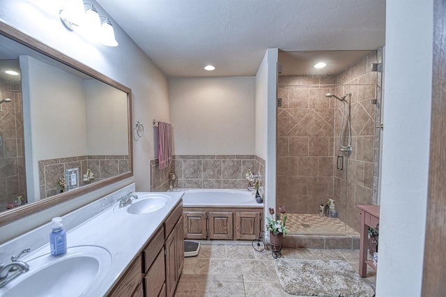 908 County St Unit 2932, Tuttle, OK 73089 - full bathroom featuring double vanity, a shower stall, a sink, and a bath