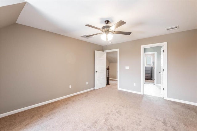 7217 SW 120th St, Oklahoma City, OK 73173 - unfurnished bedroom with baseboards, visible vents, light carpet, and ceiling fan