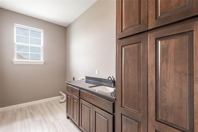 7217 SW 120th St, Oklahoma City, OK 73173 - bathroom with vanity and baseboards