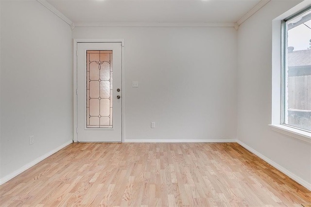 7705 Rumsey Rd, Oklahoma City, OK 73132 - empty room with crown molding, light wood-style flooring, and baseboards