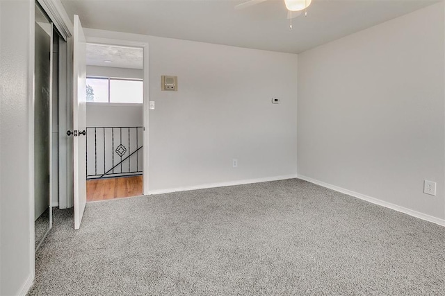 7705 Rumsey Rd, Oklahoma City, OK 73132 - carpeted spare room with baseboards and a ceiling fan