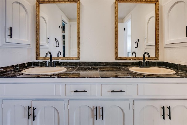 7705 Rumsey Rd, Oklahoma City, OK 73132 - bathroom featuring double vanity and a sink