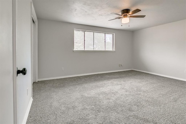 7705 Rumsey Rd, Oklahoma City, OK 73132 - unfurnished room featuring baseboards, ceiling fan, and carpet floors