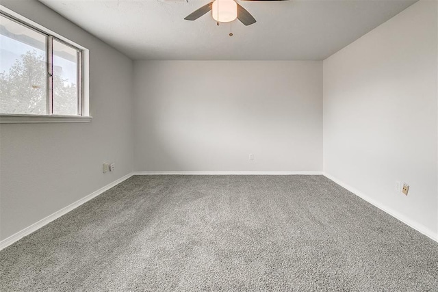 7705 Rumsey Rd, Oklahoma City, OK 73132 - unfurnished room with a ceiling fan, carpet flooring, and baseboards