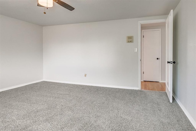 7705 Rumsey Rd, Oklahoma City, OK 73132 - unfurnished room featuring baseboards, ceiling fan, and light colored carpet