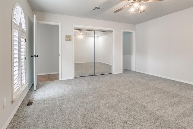 7705 Rumsey Rd, Oklahoma City, OK 73132 - unfurnished bedroom with baseboards, visible vents, carpet floors, and a closet