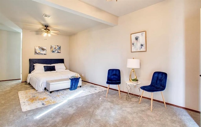 carpeted bedroom with baseboards, visible vents, and beam ceiling