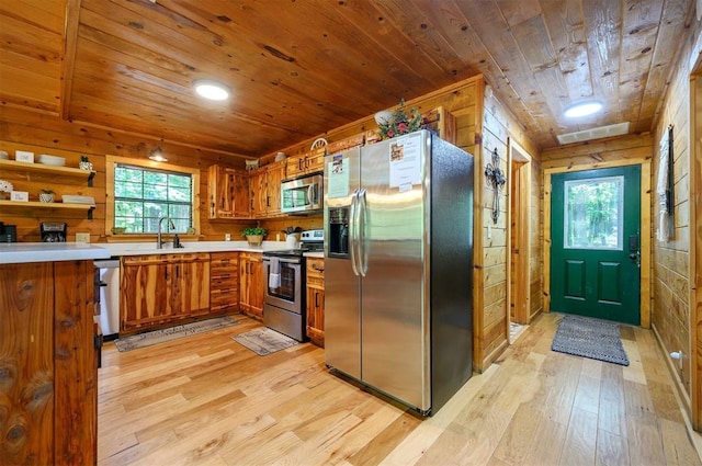 kitchen featuring stainless steel appliances, wood ceiling, brown cabinetry, light wood-style flooring, and light countertops