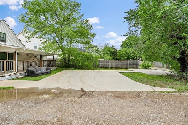 view of patio featuring fence