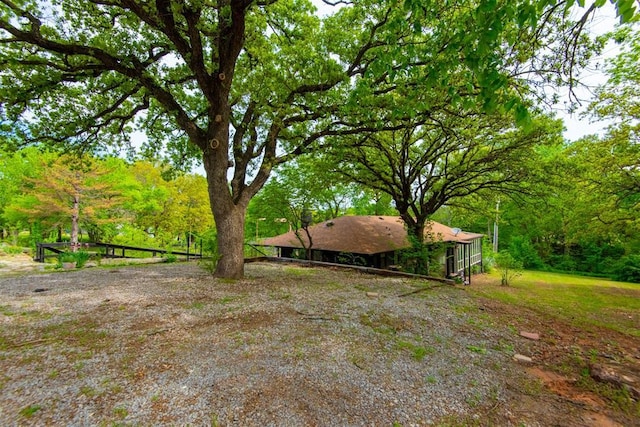 73 E Shore Dr, Arcadia, OK 73007 - view of yard featuring a forest view