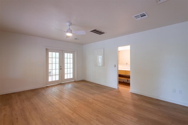 73 E Shore Dr, Arcadia, OK 73007 - unfurnished room with visible vents, ceiling fan, and light wood-style flooring