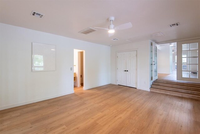 73 E Shore Dr, Arcadia, OK 73007 - unfurnished room with attic access, visible vents, light wood-type flooring, and baseboards