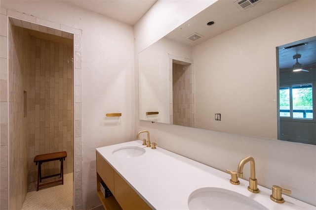 73 E Shore Dr, Arcadia, OK 73007 - full bath featuring double vanity, a sink, tiled shower, and visible vents