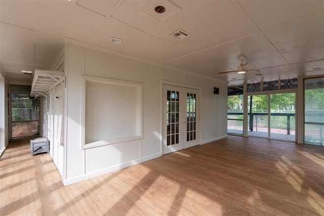 73 E Shore Dr, Arcadia, OK 73007 - unfurnished sunroom with visible vents, ceiling fan, and french doors