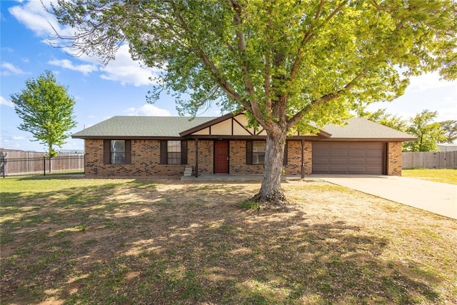 single story home featuring brick siding, fence, a garage, driveway, and a front lawn