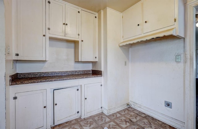kitchen with dark countertops