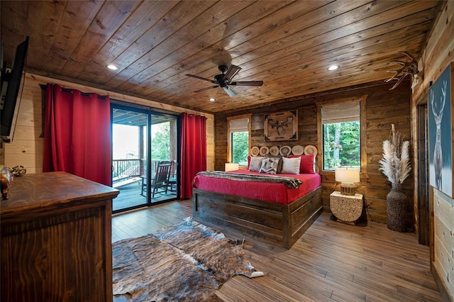 1329 Lake Ridge Ln, Broken Bow, OK 74728 - bedroom with wood ceiling, wooden walls, access to exterior, hardwood / wood-style flooring, and recessed lighting