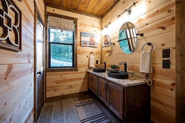 1329 Lake Ridge Ln, Broken Bow, OK 74728 - bathroom with wood walls, wooden ceiling, hardwood / wood-style flooring, and vanity