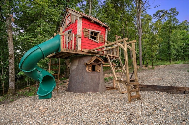 1329 Lake Ridge Ln, Broken Bow, OK 74728 - view of play area featuring view of wooded area