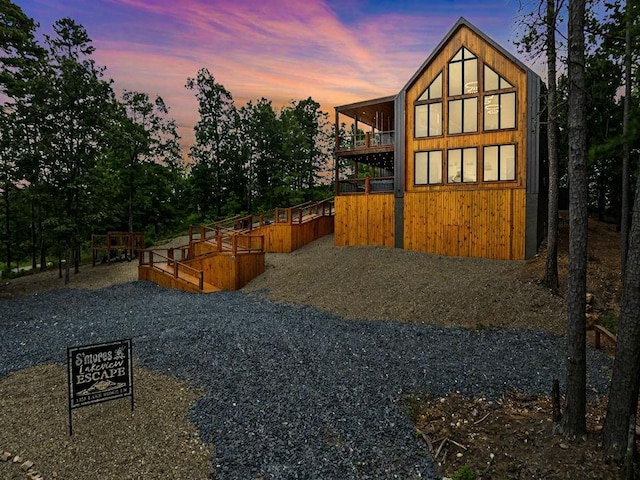 1329 Lake Ridge Ln, Broken Bow, OK 74728 - view of back of property at dusk
