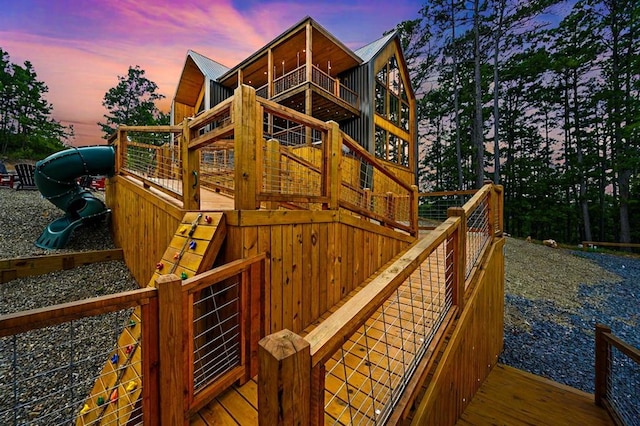 1329 Lake Ridge Ln, Broken Bow, OK 74728 - deck at dusk with stairway