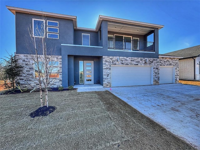view of front facade featuring a balcony, stucco siding, and stone siding