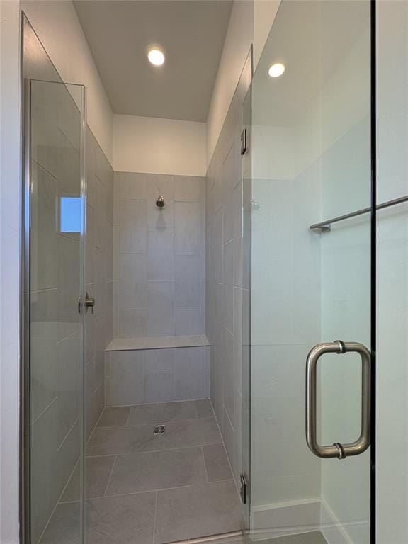 full bathroom featuring tile patterned flooring, a shower stall, and recessed lighting