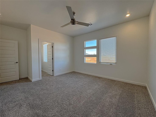 unfurnished bedroom with a ceiling fan, baseboards, recessed lighting, and carpet
