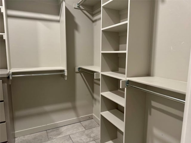 4129 Sambar St, Tuttle, OK 73089 - walk in closet featuring light tile patterned floors