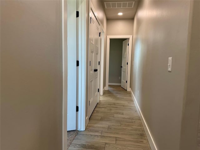 4129 Sambar St, Tuttle, OK 73089 - corridor featuring baseboards and wood finished floors