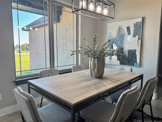 4129 Sambar St, Tuttle, OK 73089 - dining space with wood finished floors and baseboards
