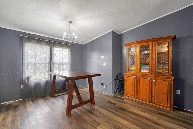 dining space featuring crown molding, a textured ceiling, a textured wall, and dark wood-type flooring