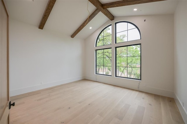 empty room featuring recessed lighting, baseboards, vaulted ceiling with beams, and light wood-type flooring