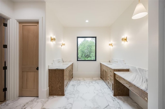 bathroom with vanity, recessed lighting, marble finish floor, and baseboards