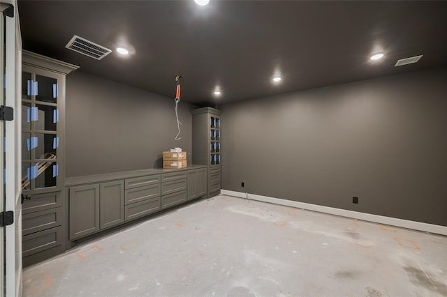 interior space with visible vents, concrete floors, and recessed lighting