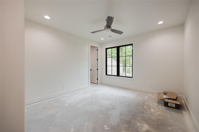 unfurnished room featuring ceiling fan, unfinished concrete floors, recessed lighting, and baseboards